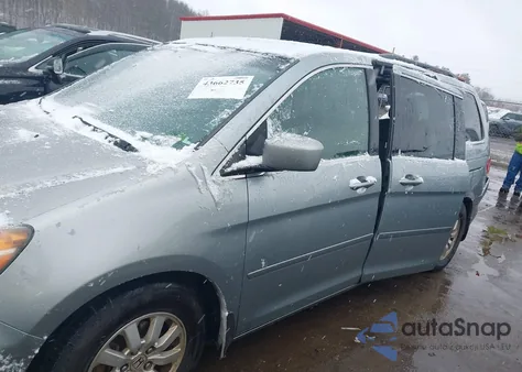 2010 Honda Odyssey Ex-L z USA, uszkodzony, nr VIN 5FNRL3H61AB056847